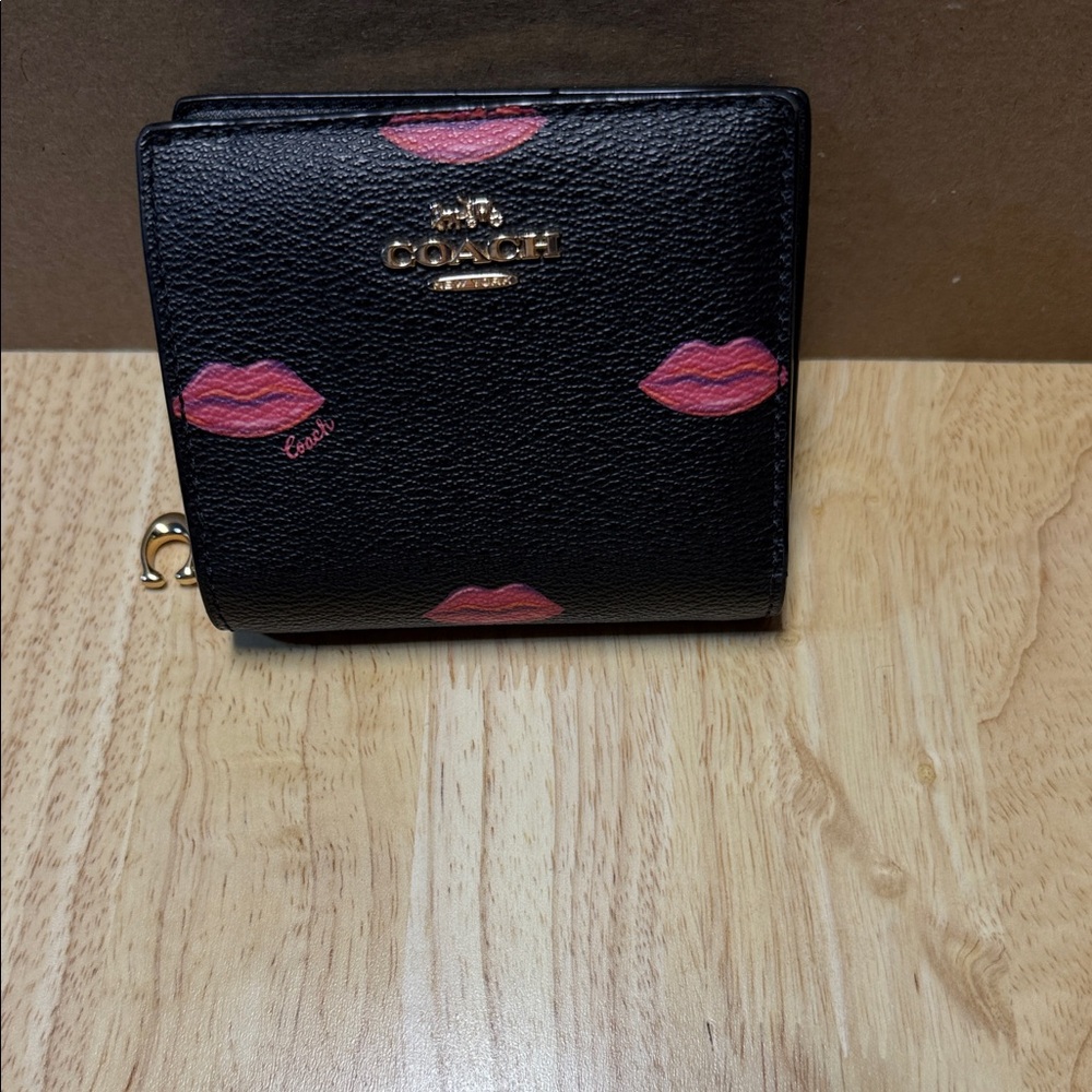 Coach Black Wallet with Pink Lip Print